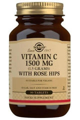 Solgar Vitamin C 1500 mg supplement with rose hips in a brown bottle, vegan and sugar-free, containing 90 tablets.