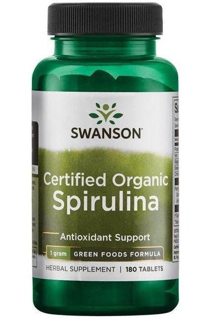 Swanson Certified Organic Spirulina supplement bottle, 180 tablets, providing antioxidant support and green food formula.