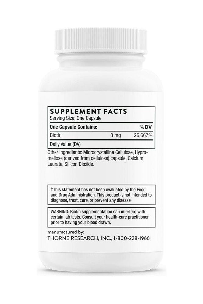 Thorne Biotin supplement facts showing biotin content and daily value for hair and nail health.