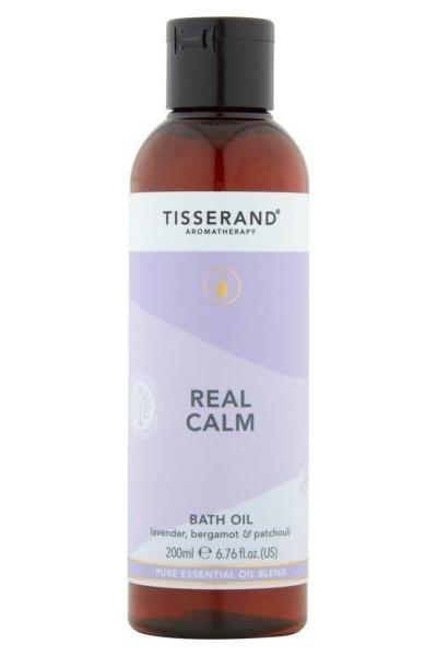 Tisserand Real Calm Bath Oil with lavender, bergamot, and patchouli for relaxation, 200ml bottle.