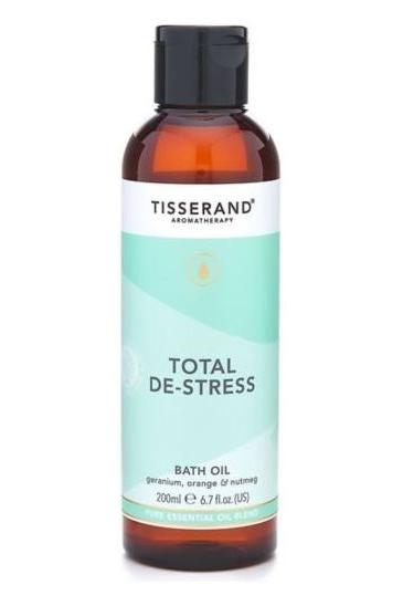 Tisserand Aromatherapy Total De-Stress Bath Oil with geranium, orange, and nutmeg for relaxation.
