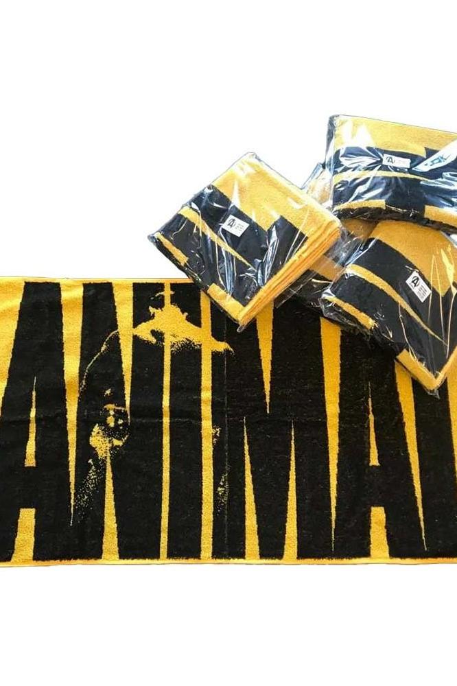 Universal Nutrition Animal Gym Towel in bold black and yellow, featuring a unique design and soft fabric for comfort.